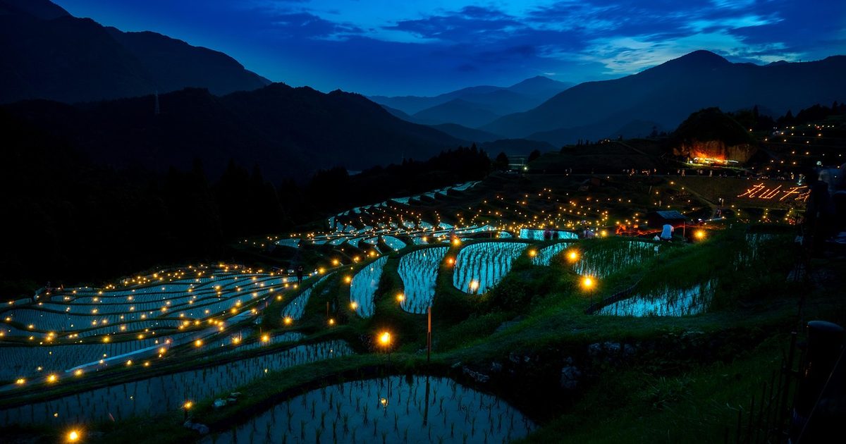 Rice terraces lit up at night, Maruyama Senmaida, Japan
